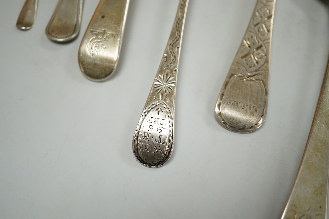 A pair of George III Old English pattern table spoons by Sumner & Crossley, London, 1778, 21.6cm, together with ten other items of Georgian and later silver flatware, including table spoons, teaspoons and a fork, various
